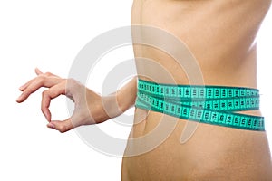 Tape measure on waist and simbol okey isolated