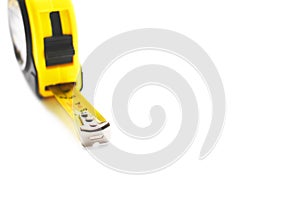 Tape measure on a white background. A useful building tool. Tape measure close-up