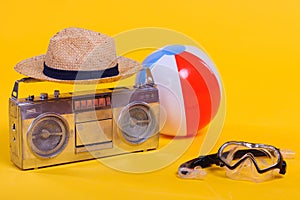 tape recorder, hat, beach ball and snorkel with scuba mask