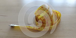 Yellow tapeline on a table