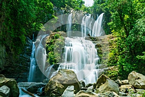 The tapering Nauyaca Waterfalls in Costa rica, a majestic cascading fall in Dominical province, Costa Rica