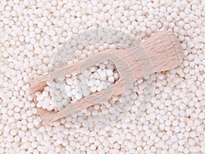 Tapioca pearls in wooden shovel