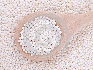 Tapioca pearls in wooden spoon