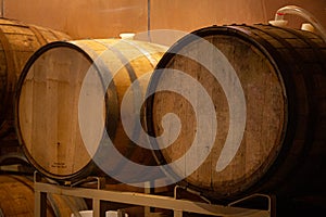 Tapped Wooden Casks of Undetermined Wood Sit in a Vault