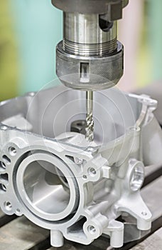 Tapping automotive part by cnc machining center