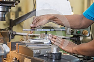 The tapping operation by skill worker.