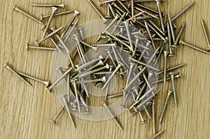 Tapping screws made of steel, metal screw, iron screw, chrome screw, screws as a background