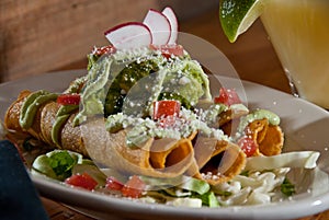 Taquitos and guacamole