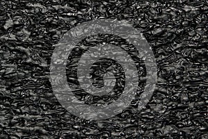 Tar black background expanded polyethylene foam sample.