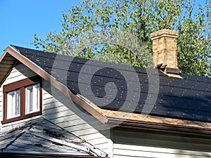 Tar paper on a roof photo