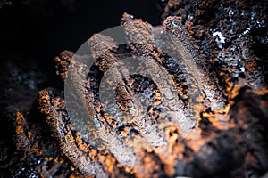 Tar and soot on the pipes of a solid fuel boiler close-up