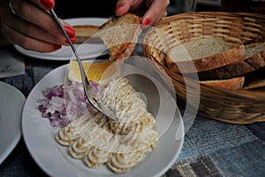 Taramasalata or taramosalata  is a Greek meze made from tarama, the salted and cured roe of the cod, carp, or grey mullet bottarga