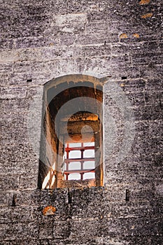 Tarascon castle granete inside, barred prison window