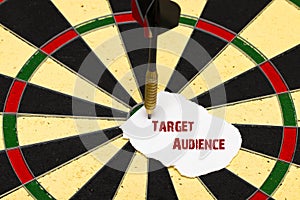 Target Audience. Darts with dart which was pinned a sheet of pap