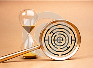 Target dart icon in middle of maze game in magnifying glass lens near hourglass on yellow background. Business solution, planning