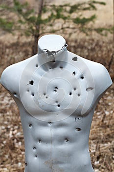 Target practicing with gun In the shooting range. Target for shooting. Outdoor.
