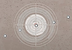 Target in a shooting range with bullet holes