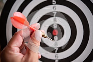 Targeting concept.Bullseye is a target of business. Dart is an opportunity and Dartboard is the target and goal. So both of that