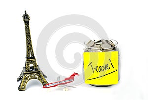 TargetTarget for travel - concept saving money in a glass and word `travel` on white background