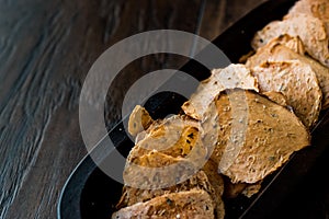 Tarhana cipsi / chips or crackers in a wooden bowl.