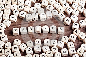 Tariffs, letter dices word photo