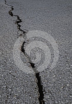 Tarmac road cracks and damaged by earthquake disaster