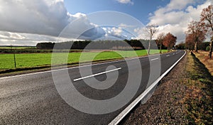 Tarmac road heading to unknown