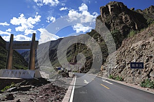 A tarmac road leads to the foot of the mountain