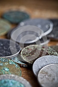 Tarnished and partially corroded old copper coins