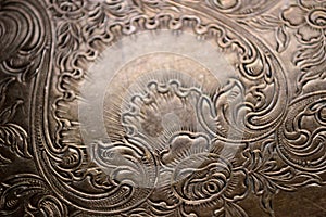 Tarnished silver scrollwork background