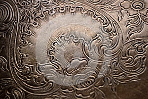 Tarnished silver scrollwork background