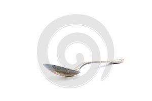 Tarnished Silver Spoon