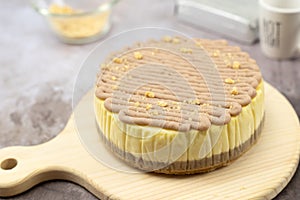 Taro cheese cake on wooden board