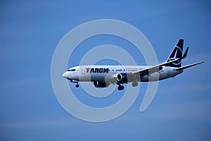 Tarom plane in the sky, landing