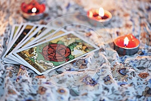 Tarot card with candlelight on the darkness background for Astrology Occult Magic illustration / Magic Spiritual Horoscopes and