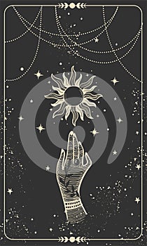 Tarot card with hand and sun. Magical boho design with stars, engraving stylization, witch cover in vintage design photo
