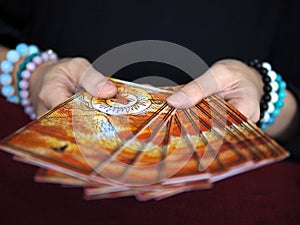 Tarot card reading fortune teller astrologer divination selected focus photo
