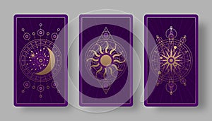 Tarot cards back set with golden crescent, sun, and star symbols