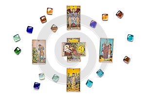 Tarot cards, candle, crystal on white background