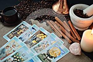 Tarot cards and fortune telling, coffee cup and coffee beans
