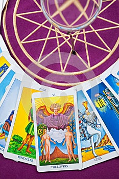 Tarot cards on a magical pentagram. photo