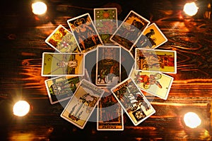 Tarot cards for tarot readings psychic as well as divination with candle light - fortune teller reading future or former and photo