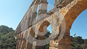 Tarragona aqueduct rising majestically on a sunny day