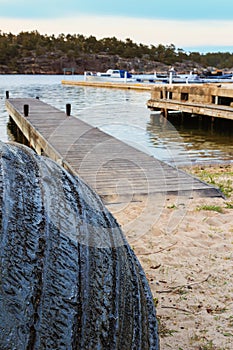 Tarred boat in Swedish archipelago coastal fishing village