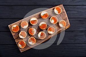 Tartalets with red caviar