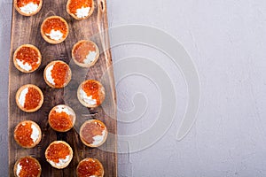 Tartalets with red caviar