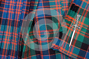 Tartan Kilt and Dagger Brooch