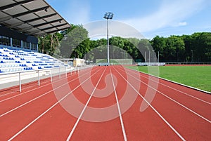 Tartan raceway in a modern stadium