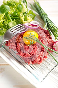 Tartare on dish photo