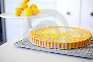 tarte au citron with a glossy, clear glaze, reflective shine